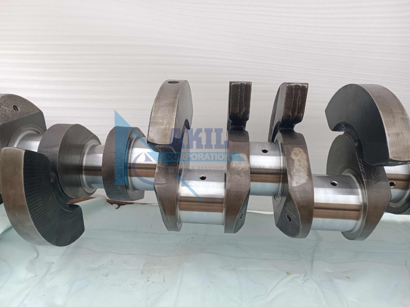 GE 7FDM12 crankshaft on the Mamsa warehouse floor, webs and journals in close-up